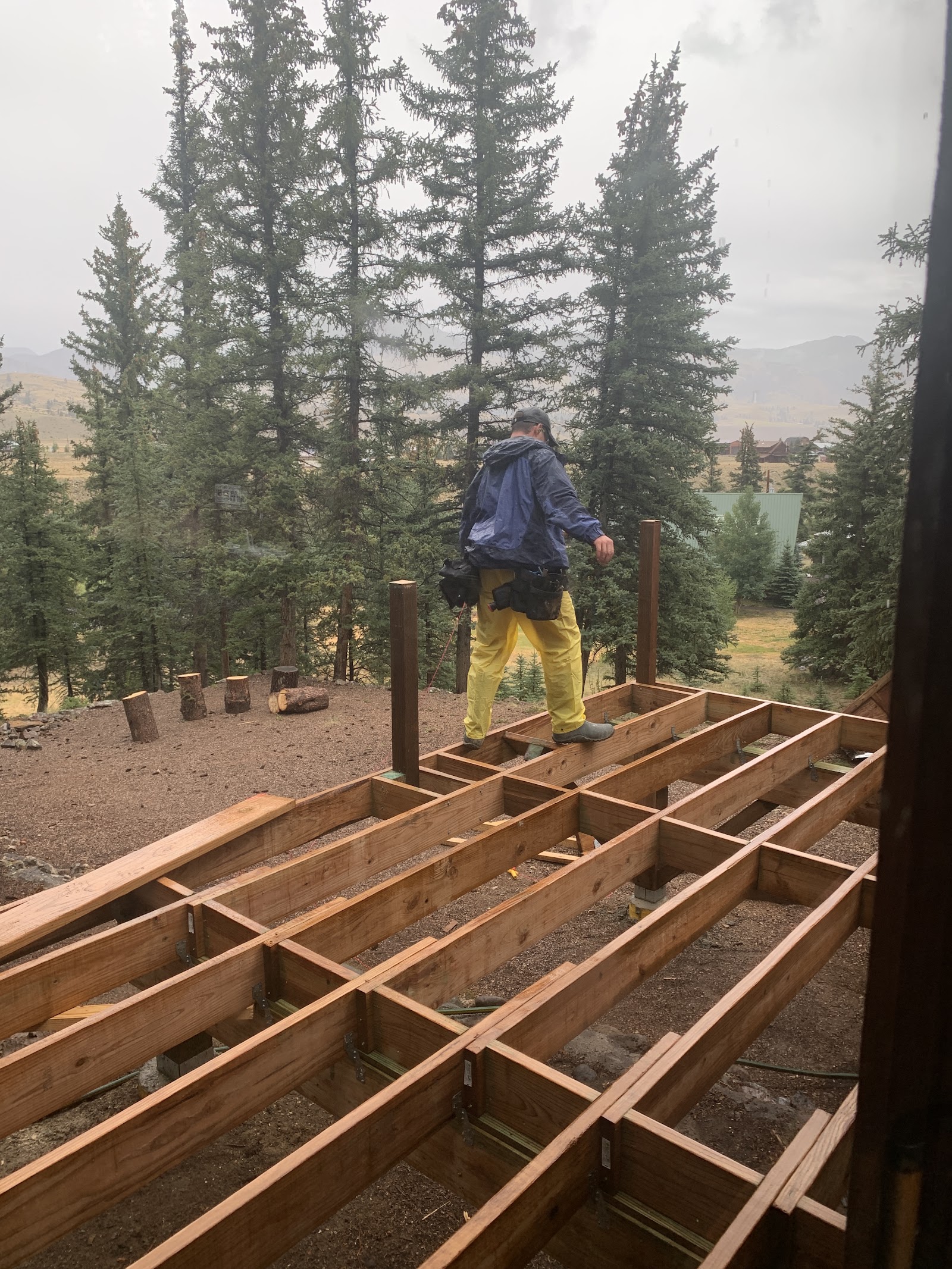 LKP Woodworks carpenter at work framing a new deck